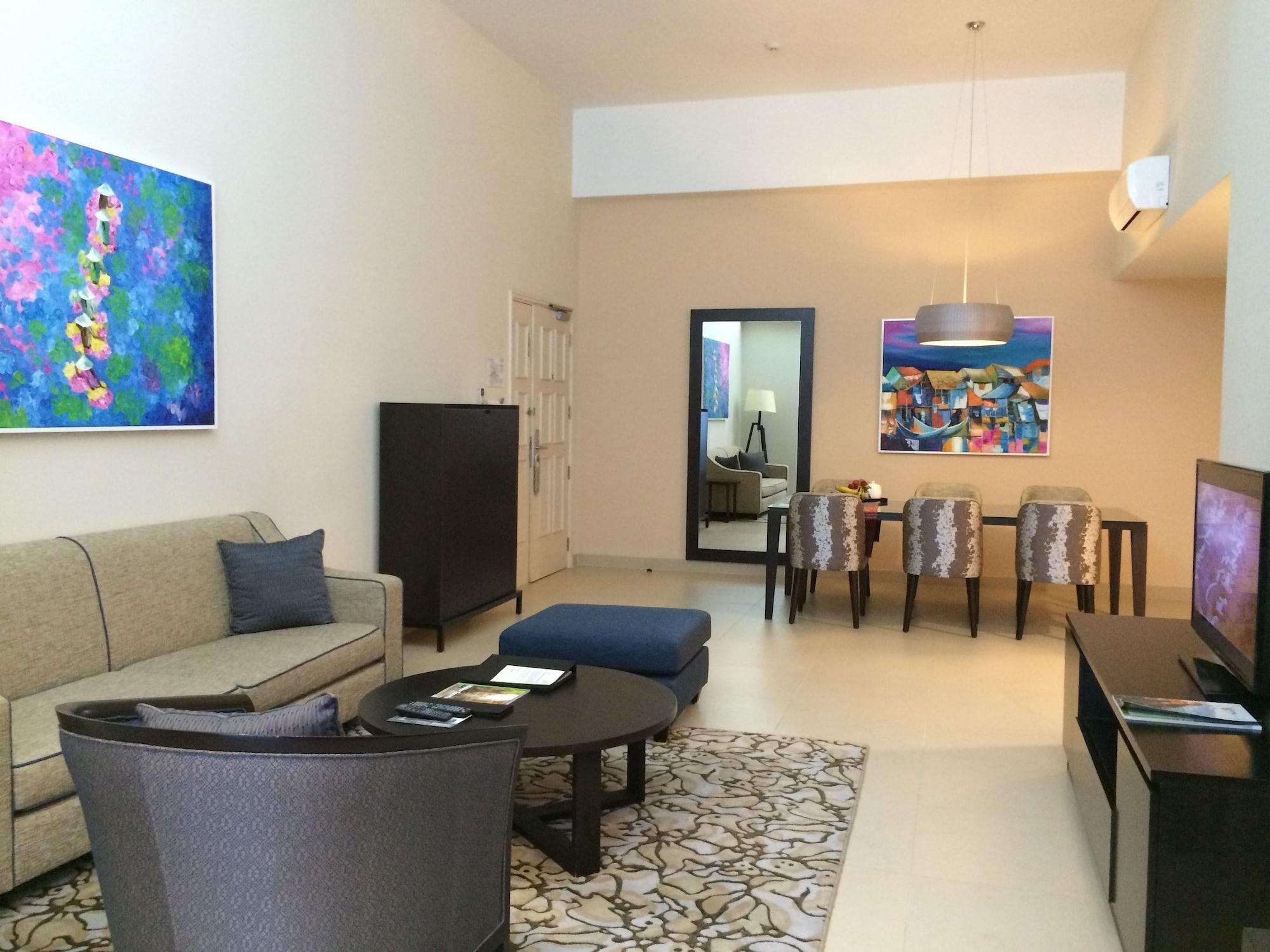 Somerset Ho Chi Minh City residencia con servicio Exterior foto A living room in a typical apartment at the Ritz-Carlton, DIFC